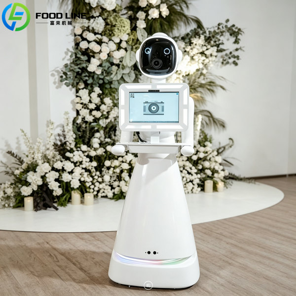 robot photo booth black screen flower wall